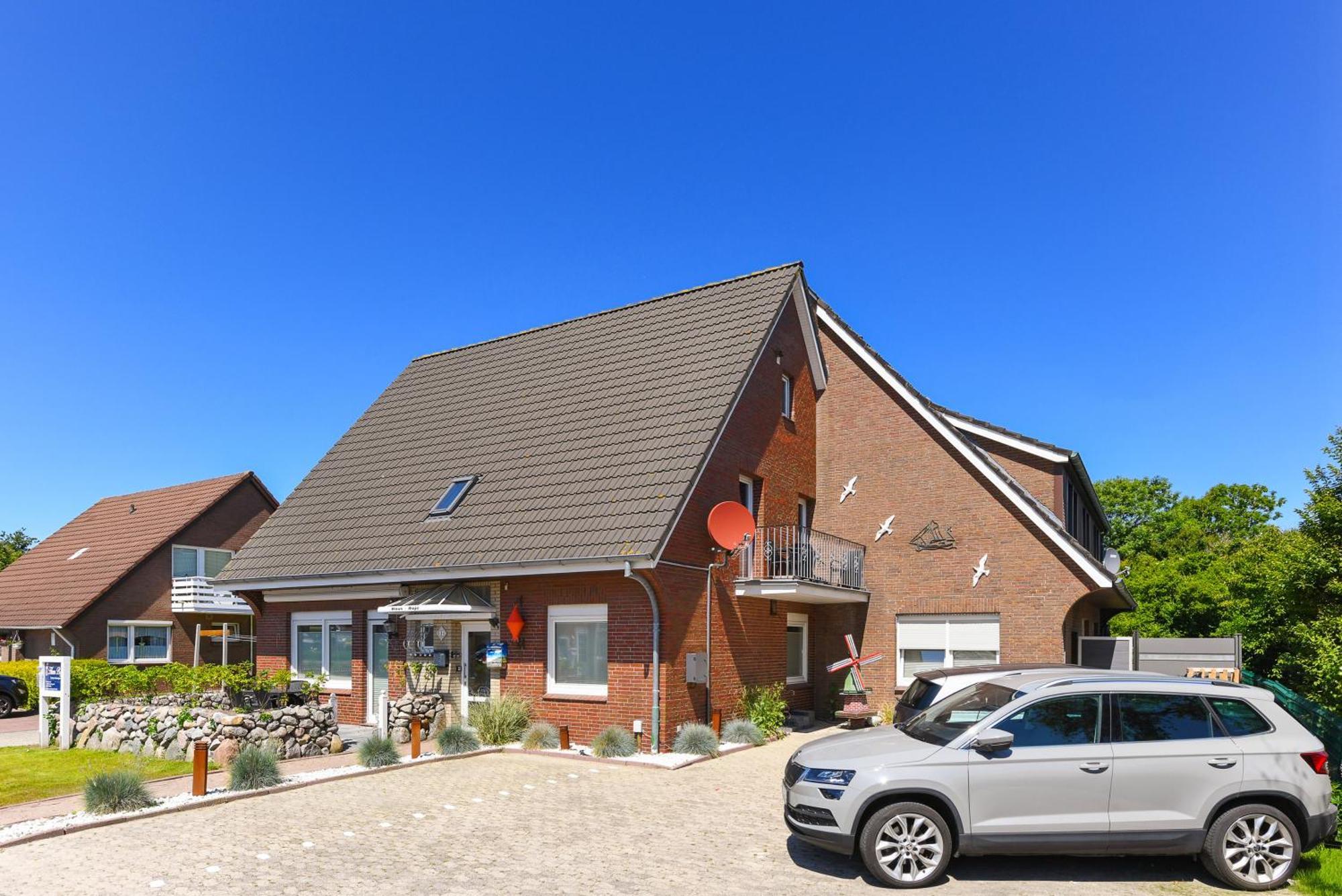 Ferienwohnung Haus Boje "Knurrhahn" Neuharlingersiel Bagian luar foto